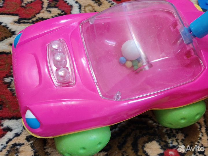Машинка каталка с ручкой