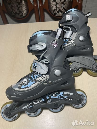 Роликовые коньки