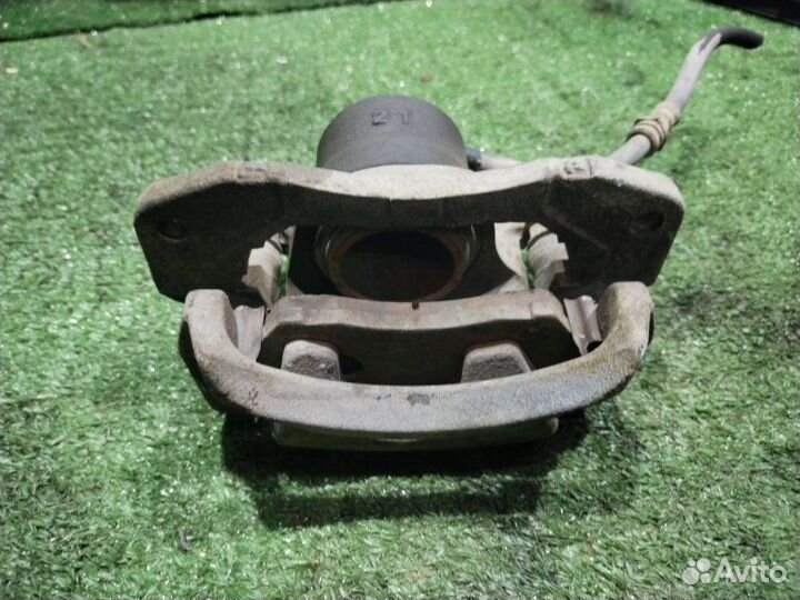 Суппорт тормозной передний правый Mazda Familia