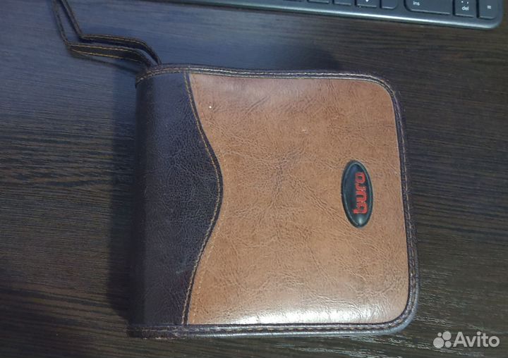 20 дисков PlayStation 2 в органайзере без коробок