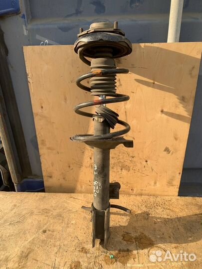 Стойка амортизатор задний левый Nissan X-Trail t30