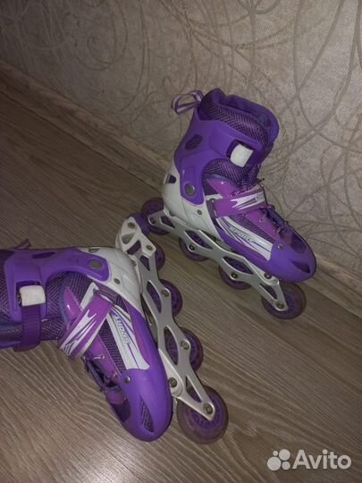 Роликовые коньки