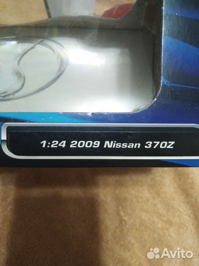 Nissan,игрушка новая модель металлическая,1:24