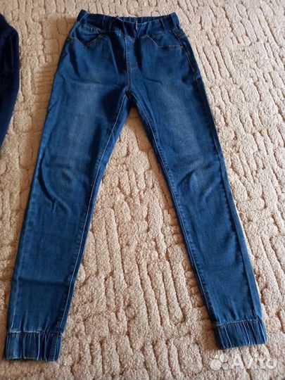 Джинсы новые