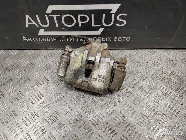 Суппорт тормозной передний левый Kia Ceed ED