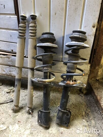 Задние амортизаторы renault logan 2