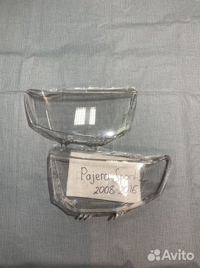 Новые Стёкла фар Mitsubishi Pajero Sport 2