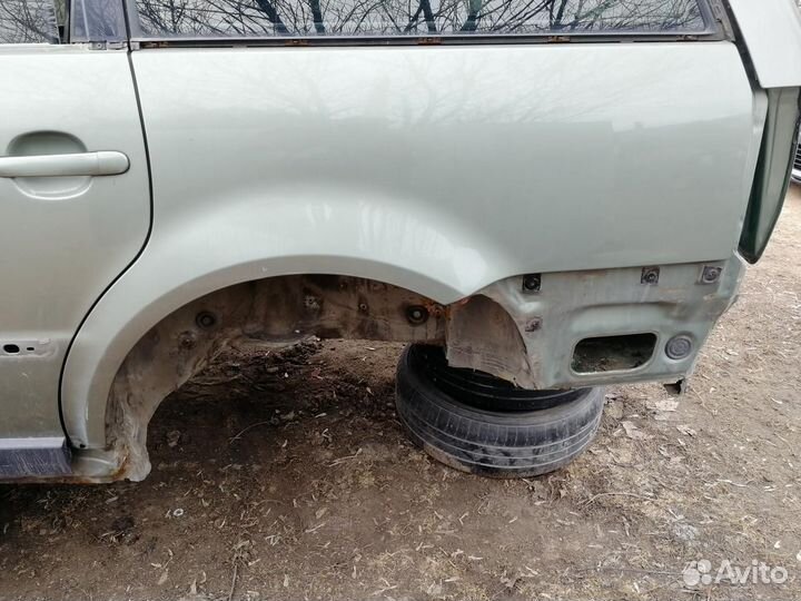 Заднее крыло Volkswagen Passat B5+ универсал