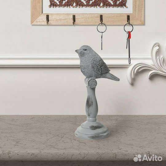 Статуэтка птица