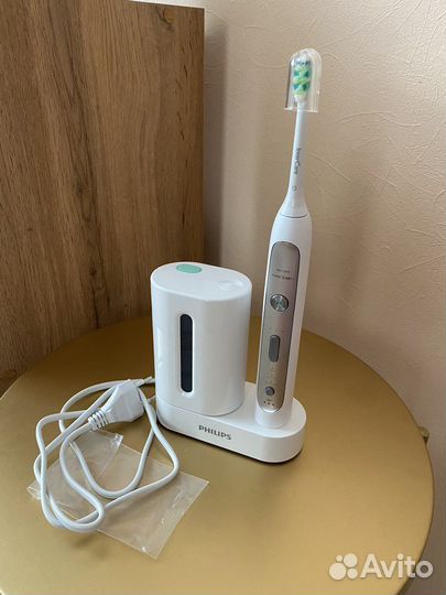 Электрическая зубная щетка philips не ирригатор