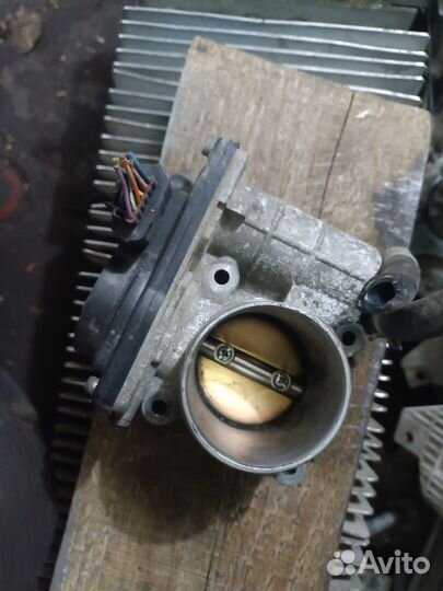 Дроссельная заслонка Nissan Tiida