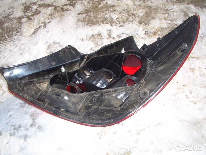 Фонарь левый Опель Корса D с06-15г