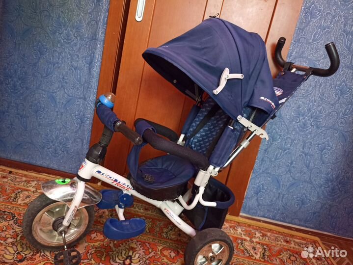 Трехколесный велосипед с родительской ручкой