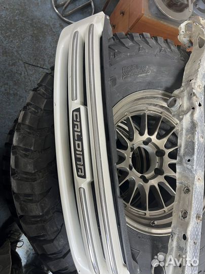 Решетка Caldina 215