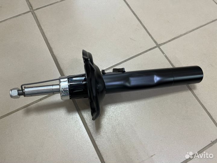 Стойка амортизатора Skoda Octavia A7 перед