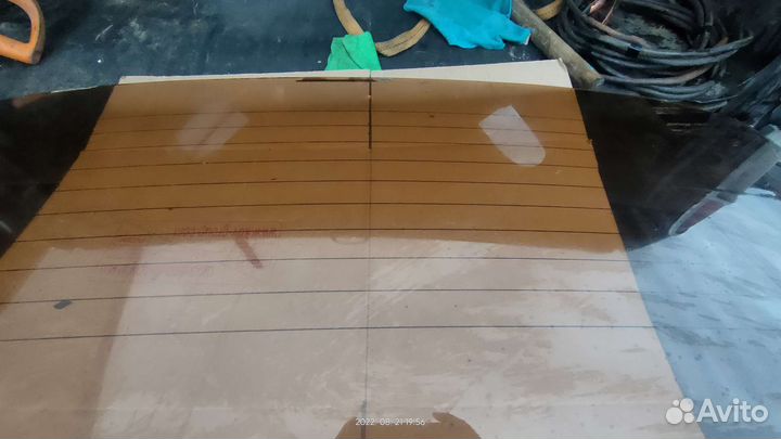 Стекло заднее Волга 3110