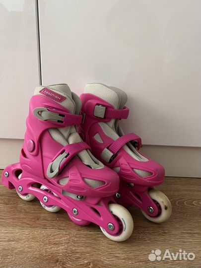 Роликовые коньки