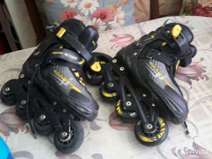 Роликовые коньки