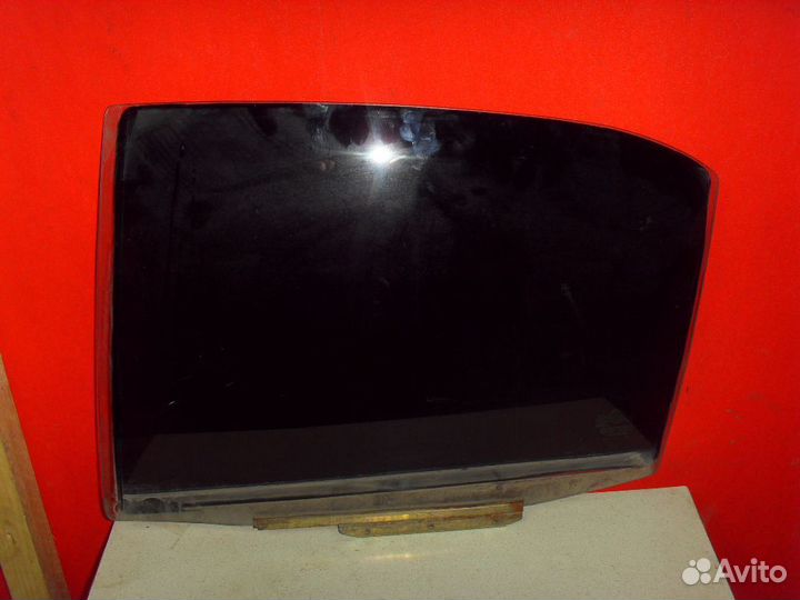 Стекло двери задней левой 1018005131 Geely MK