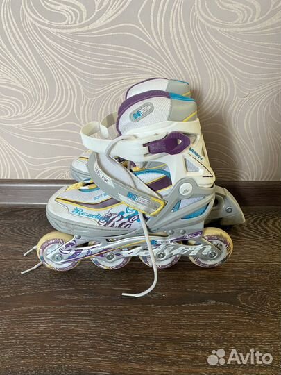 Роликовые коньки