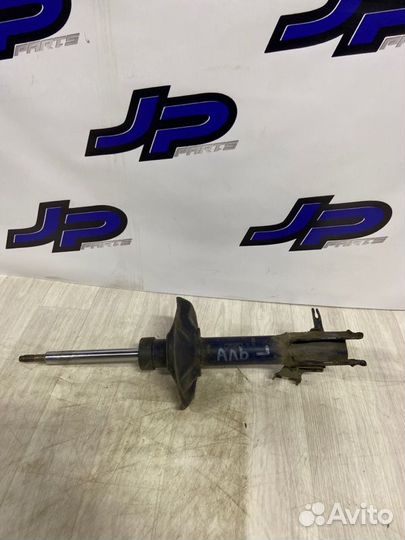 Стойка подвески передняя левая Nissan Almera 1.5