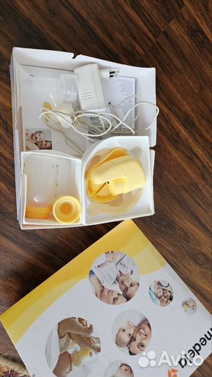 Молокоотсос medela электрический