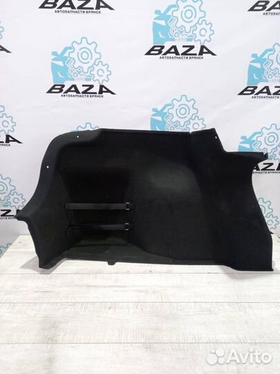 Обшивка багажника левая Kia Rio 4