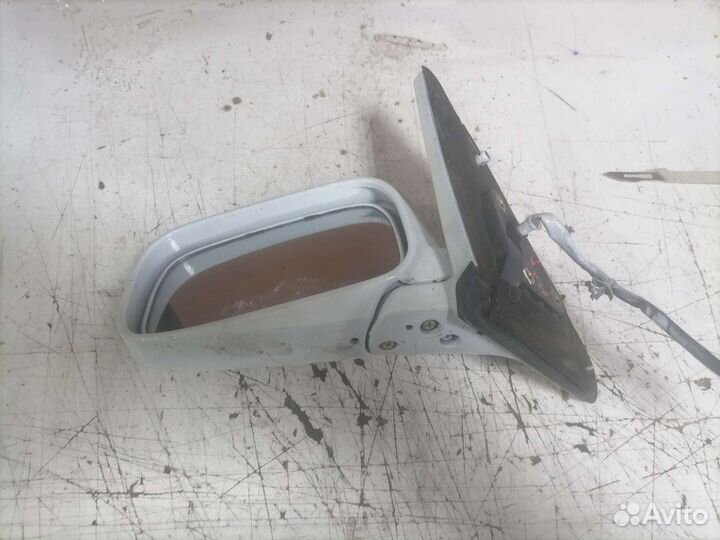 Левое зеркало Nissan Bluebird