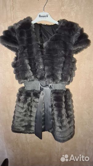 Жилет меховой удлинённый