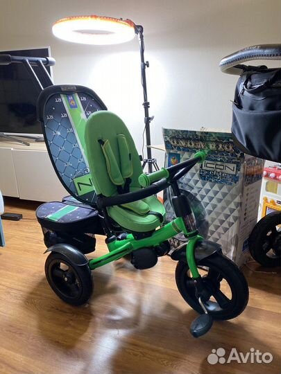 Трехколесный велосипед с ручкой icon