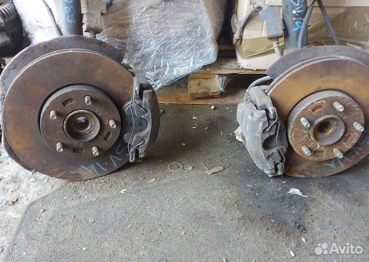 Суппорт передний Мазда 3 bl