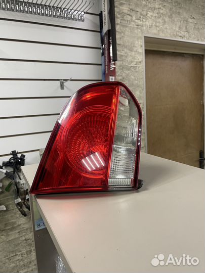 Фонарь левый в крышку Фольксваген Гольф 6