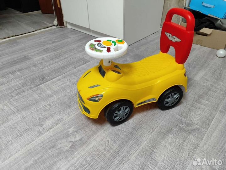 Машинка каталка толокар