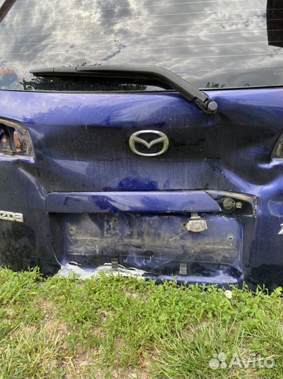 Крышка багажника mazda demio
