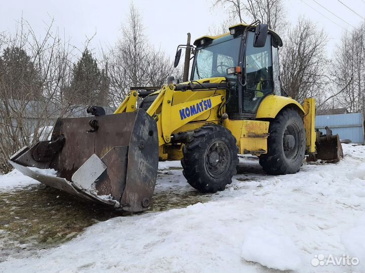 Услуги экскаватора-погрузчика