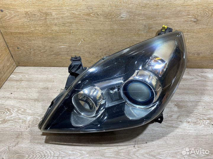 Фара левая Opel Vectra C рест адаптивная 142688