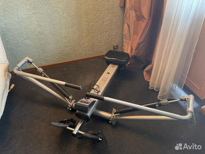 Гребной тренажер