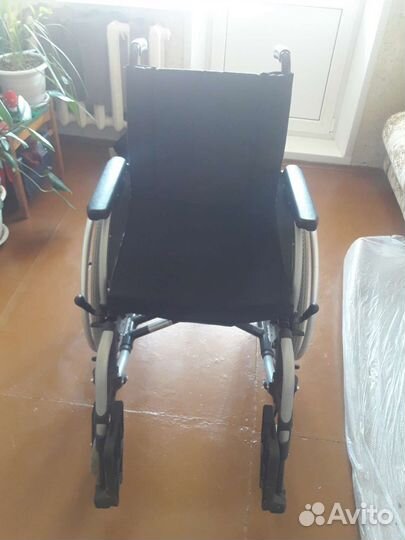 Инвалидная коляска