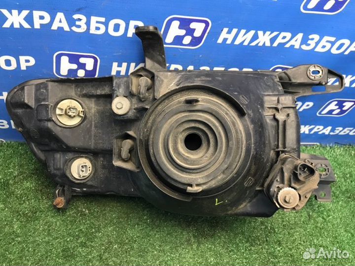 Фара левая Mitsubishi Pajero 3 V6 3.2D 4M41