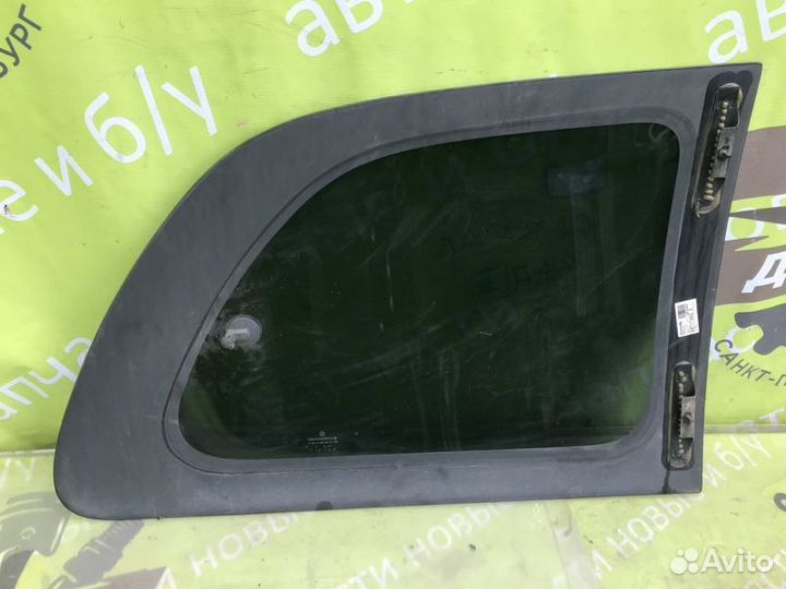 Стекло крыла форточка заднее левое Dodge Caravan 3