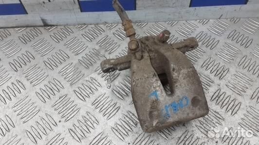 Суппорт тормозной задний левый toyota avensis T25