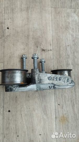Натяжитель ремня грм Opel Omega