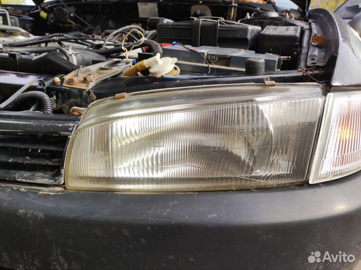 Фара левая Лансер 7