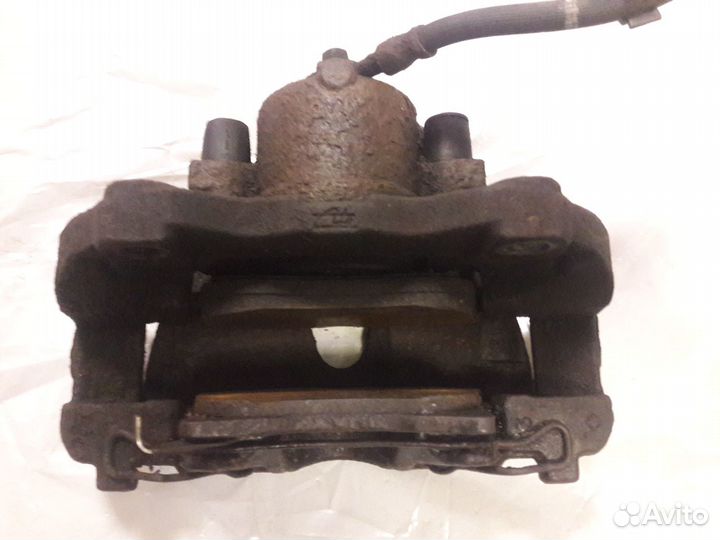 Суппорт Opel Astra H / Zafira B левый - правый