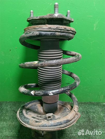 Стойка амортизатора передняя правая KIA ceed (ED)