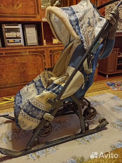 Детские санки - коляска с колесами Ника