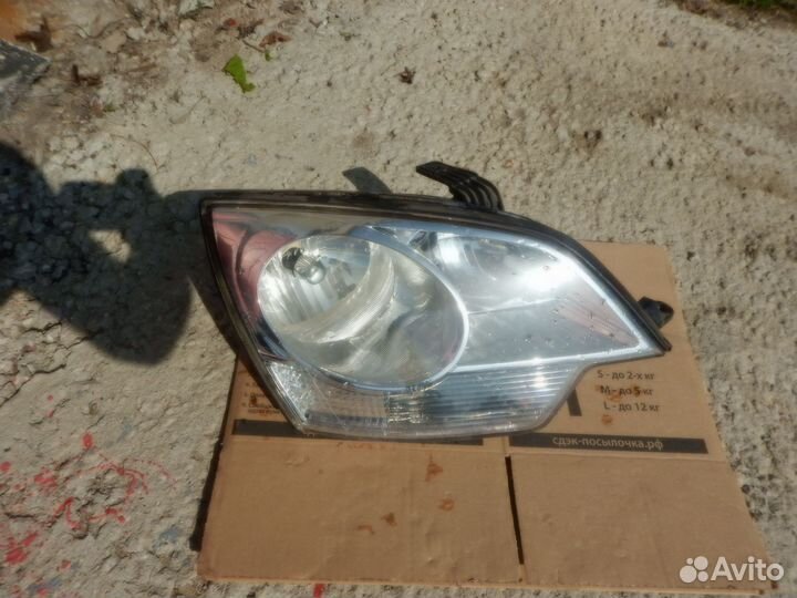 Стекло фары правой Opel Antara