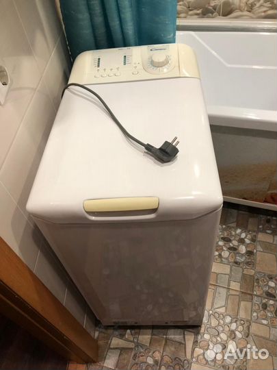 Стиральная машина с вертикальной загрузкой