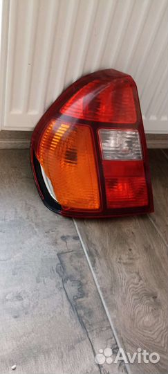 Фонарь задний левый рено симбол