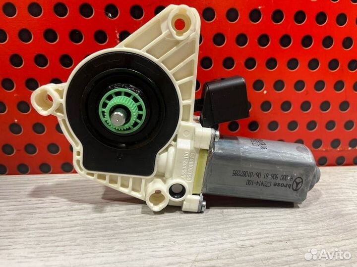 Моторчик стеклоподъемника передний левый